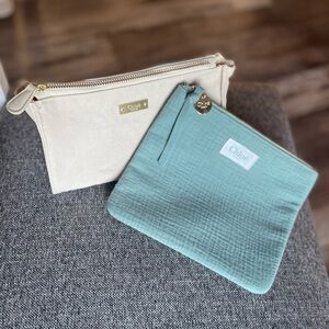 Chloe set of 2 cosmetic bags. Cream linen and a turquoise gauze material.
